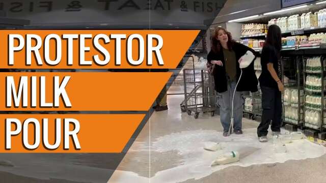 Protestor Milk Pour